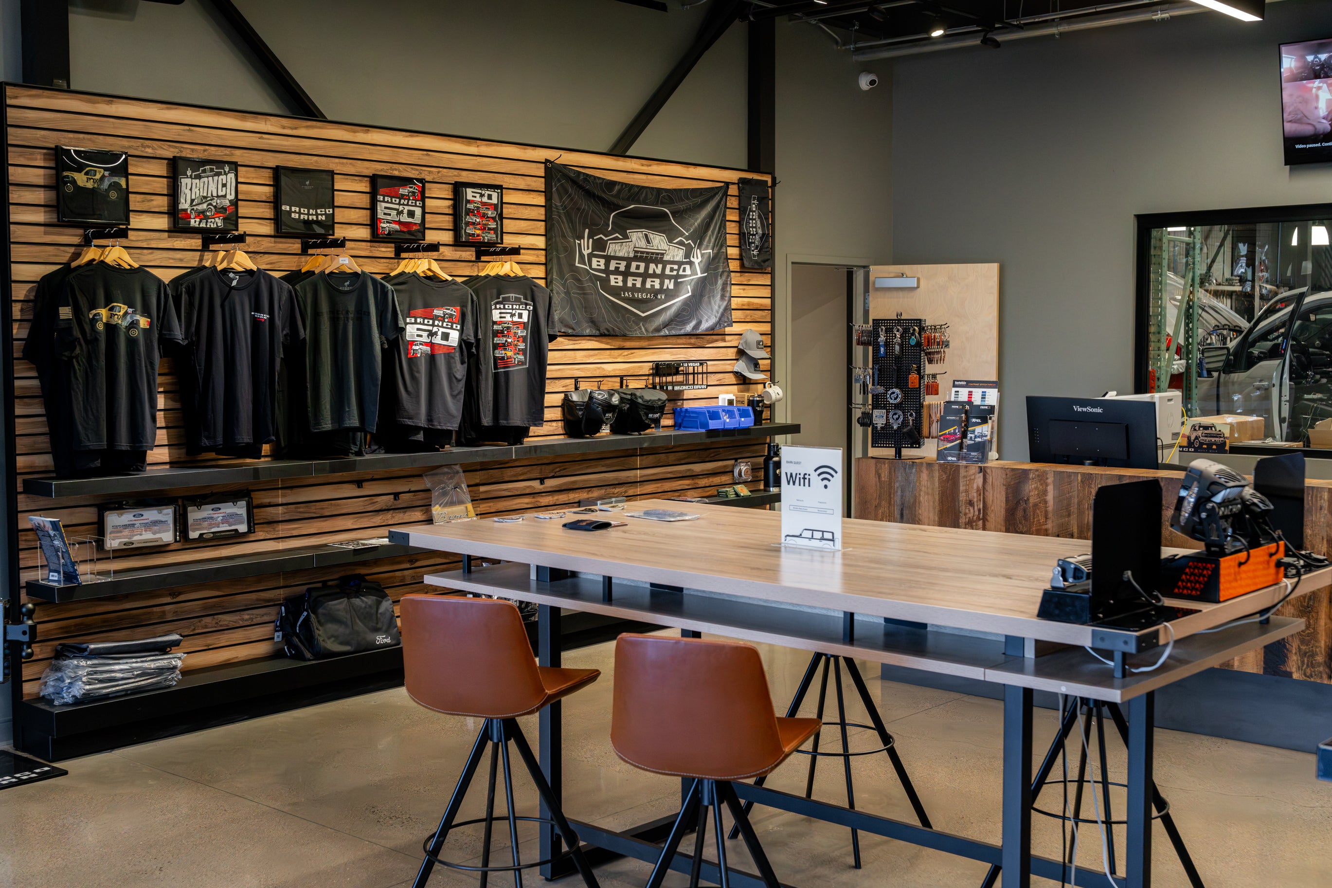 Bronco Barn showroom and reception area with apparel and accessories on display for sale